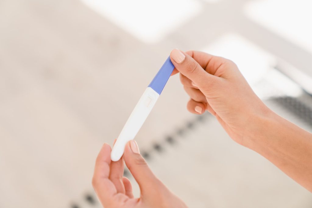 Copy space mockup positive negative pregnancy test
